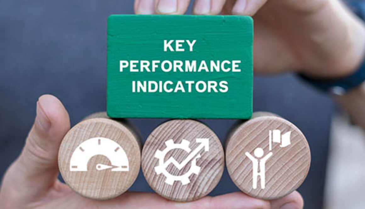 Man,Holding,Blocks,With,Icons,Sees,Inscription:,Key,Performance,Indicators.