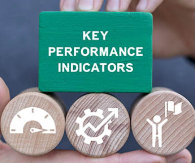 Man,Holding,Blocks,With,Icons,Sees,Inscription:,Key,Performance,Indicators.